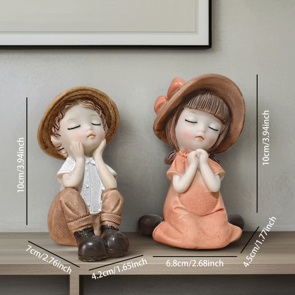 A Set of Two Adorable Mini Decorations Featuring a Boy And a Girl, Including Statues And Doll Sets Made from Resin