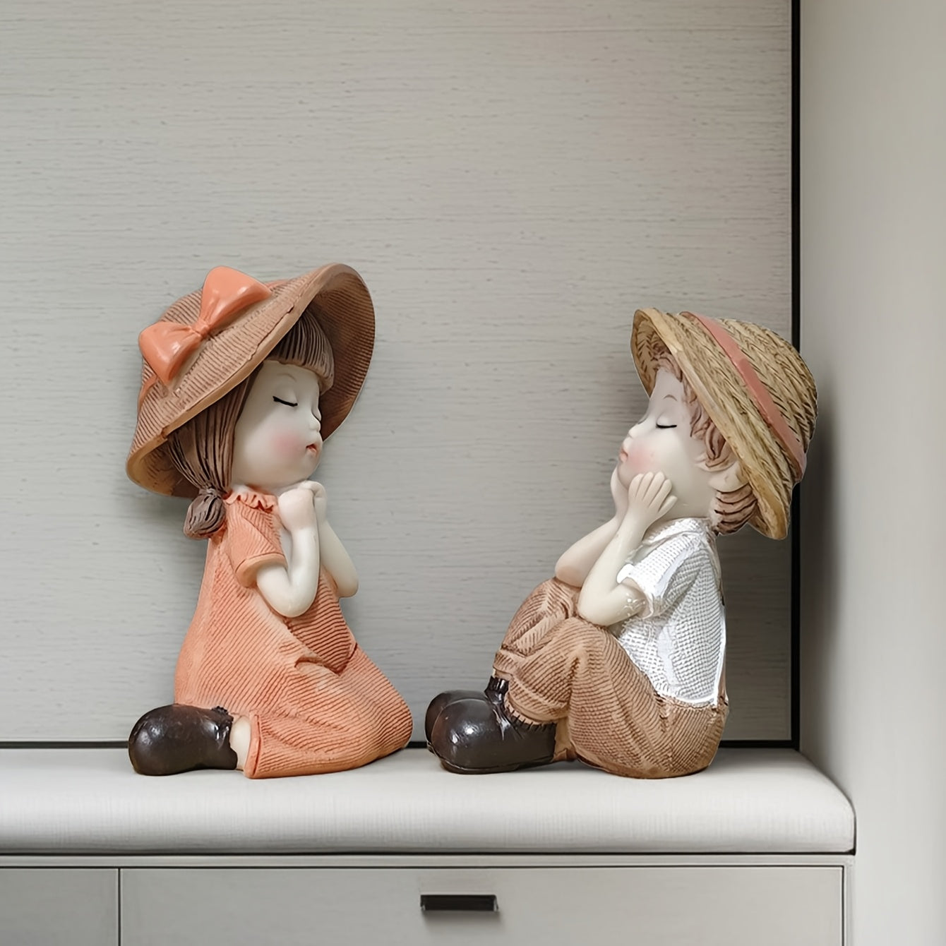 A Set of Two Adorable Mini Decorations Featuring a Boy And a Girl, Including Statues And Doll Sets Made from Resin